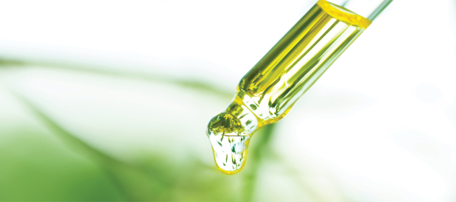 drop of an extract on a blurred background
